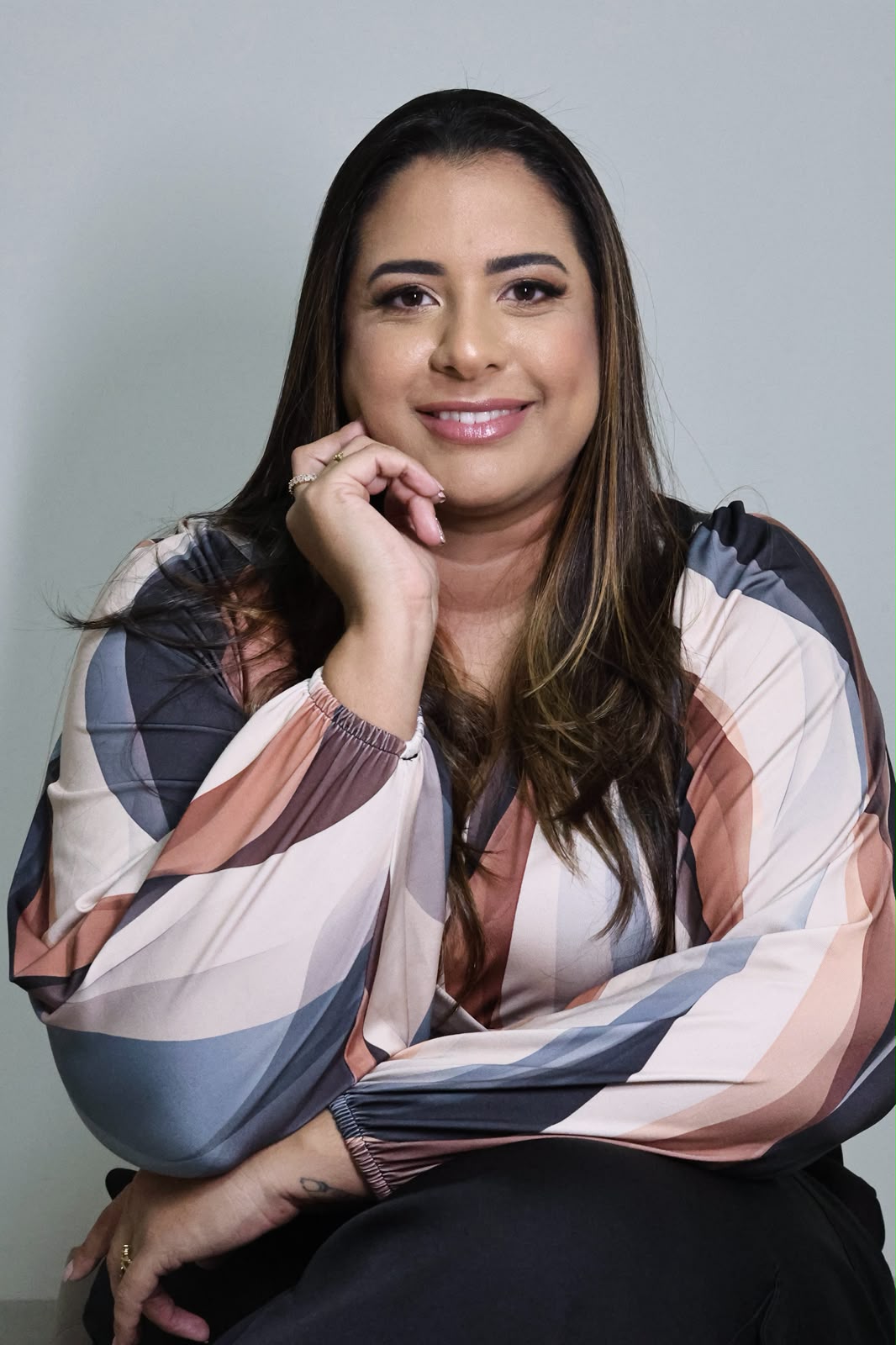 Dra. Rayssa Malheiros em seu consultório